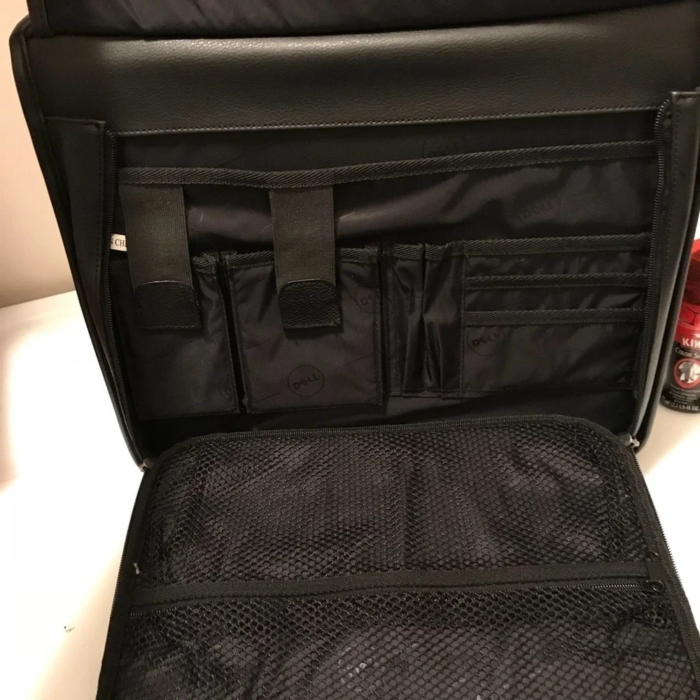 Dell laptop and office briefcase 💼